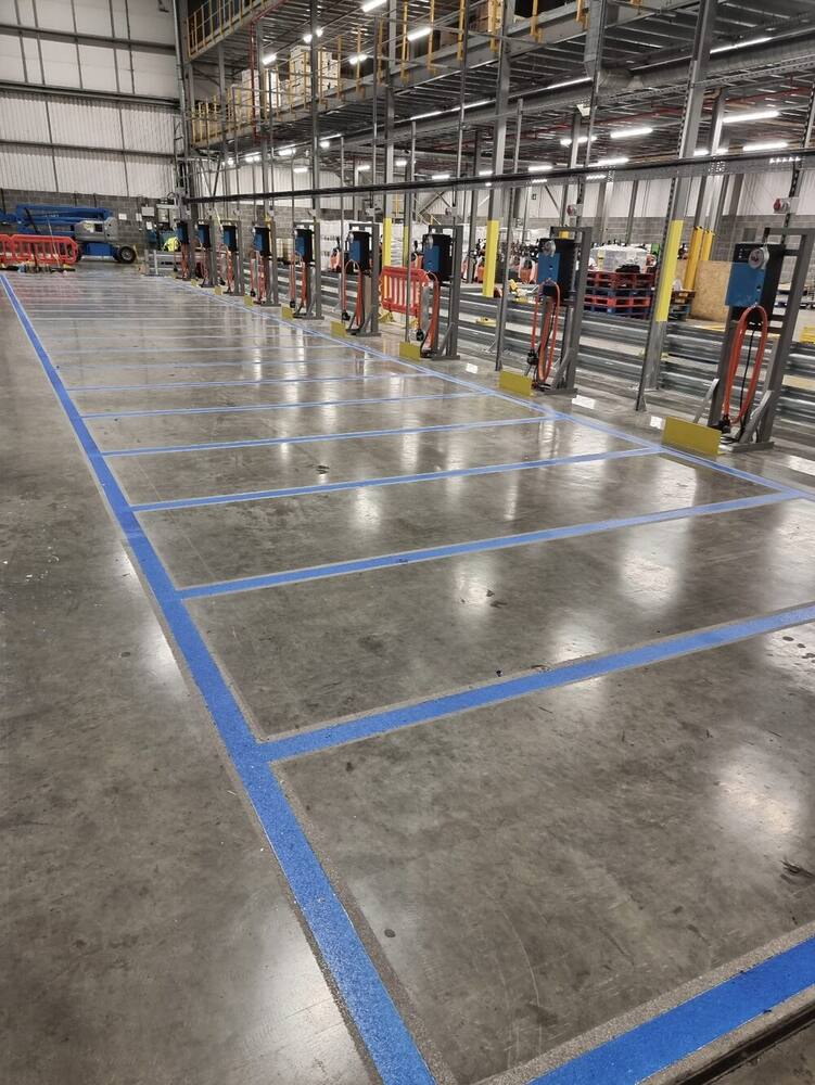UV-cured line marking inside a South Coast warehouse